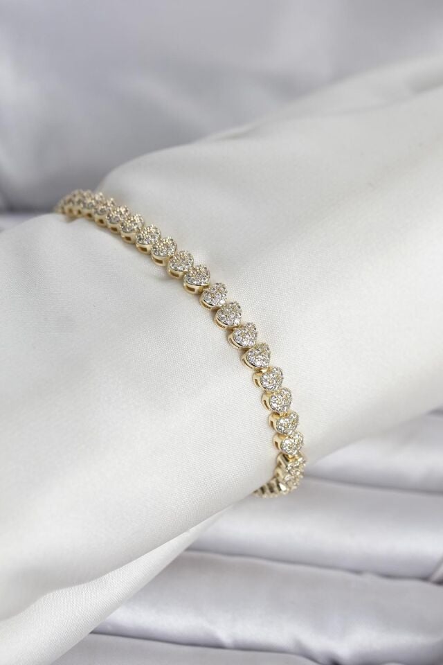 Pirinç Gold Renk Kalp Model Sıralı Zirkon Taşlı Kadın Bileklik