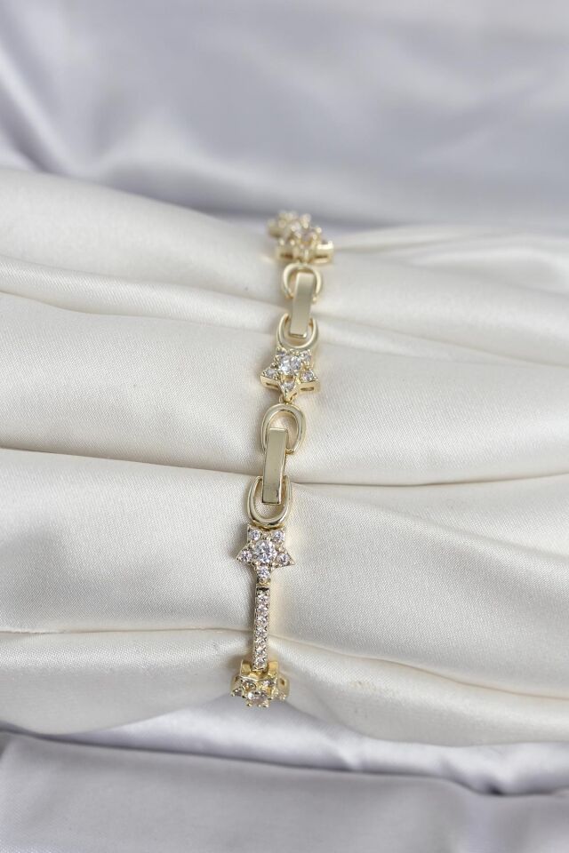 Pirinç Gold Renk Zirkon Taşlı Yıldız Model Kadın Bileklik