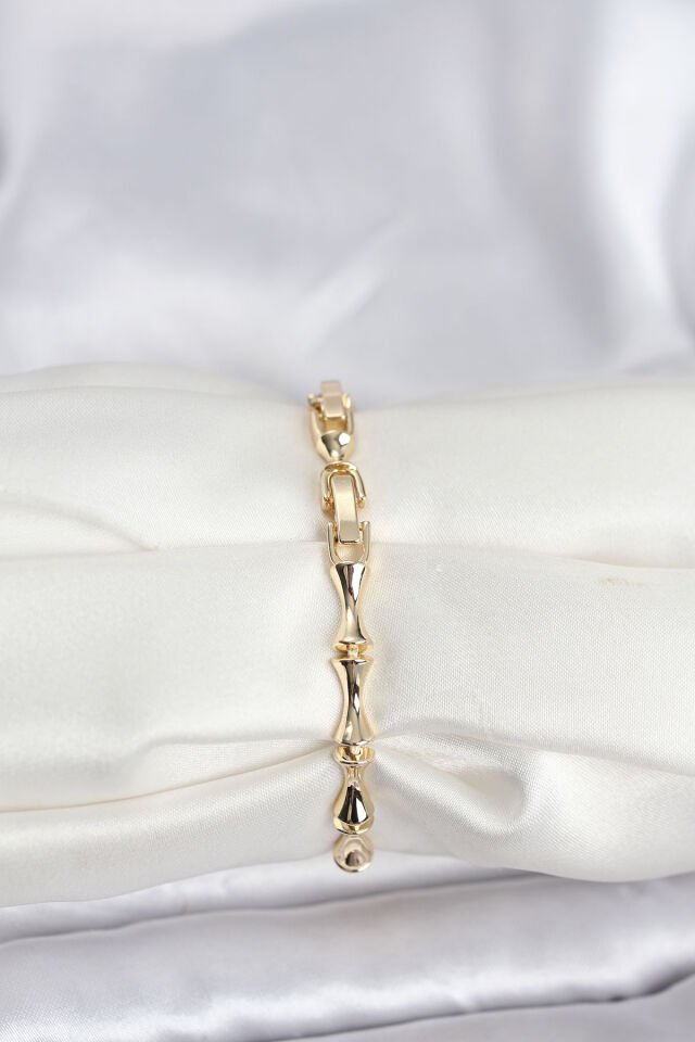 Pirinç Gold Renk VIP Seri Kemik Model Zirkon Taşlı Kadın Bileklik