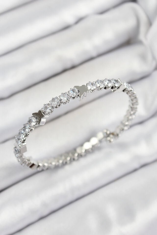 Pirinç Zirkon Taşlı Kalp Model Gümüş Renk Yaylı Kadın Bileklik