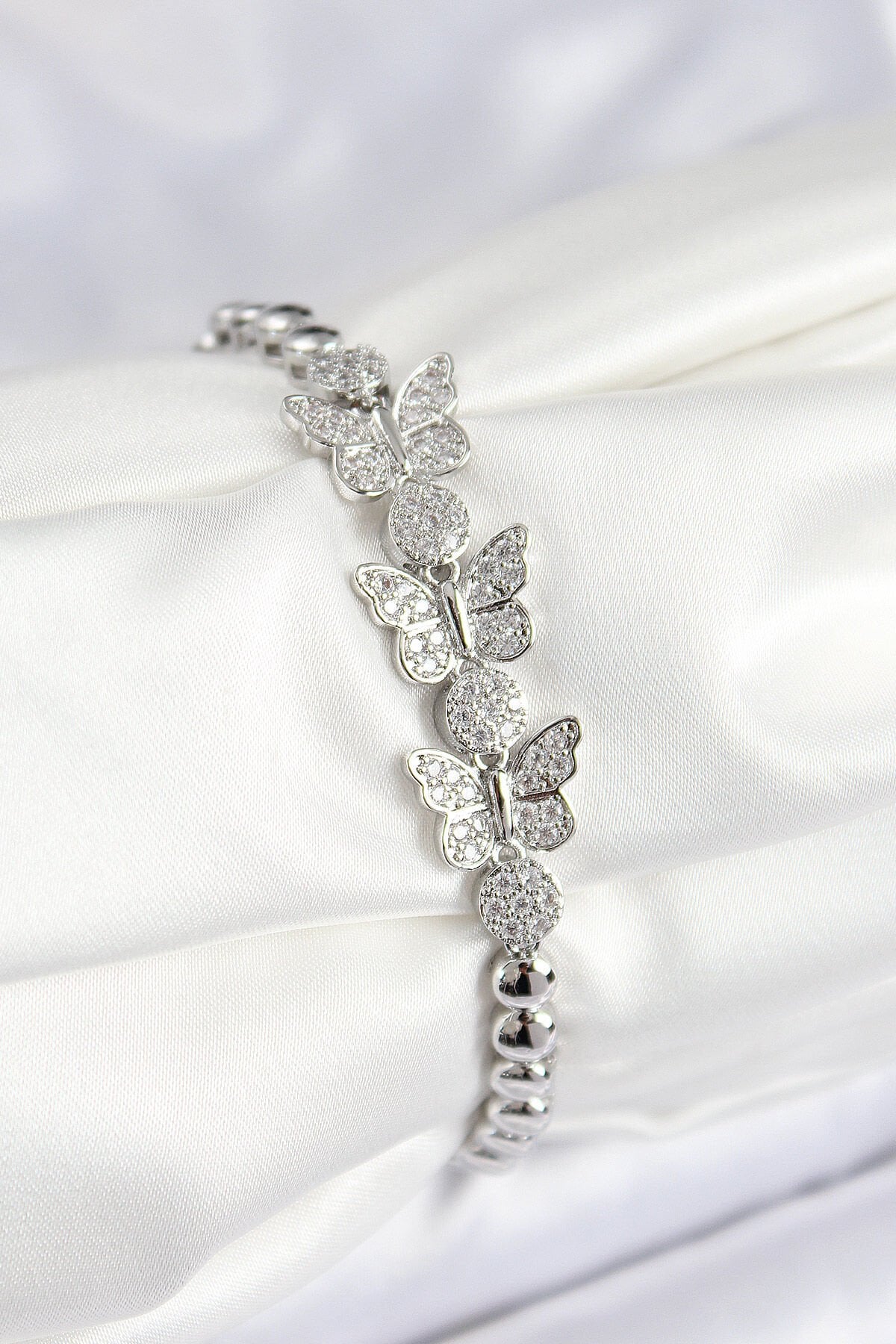 Pirinç Zirkon Taşlı Kelebek Model Gümüş Renk Kadın Bileklik