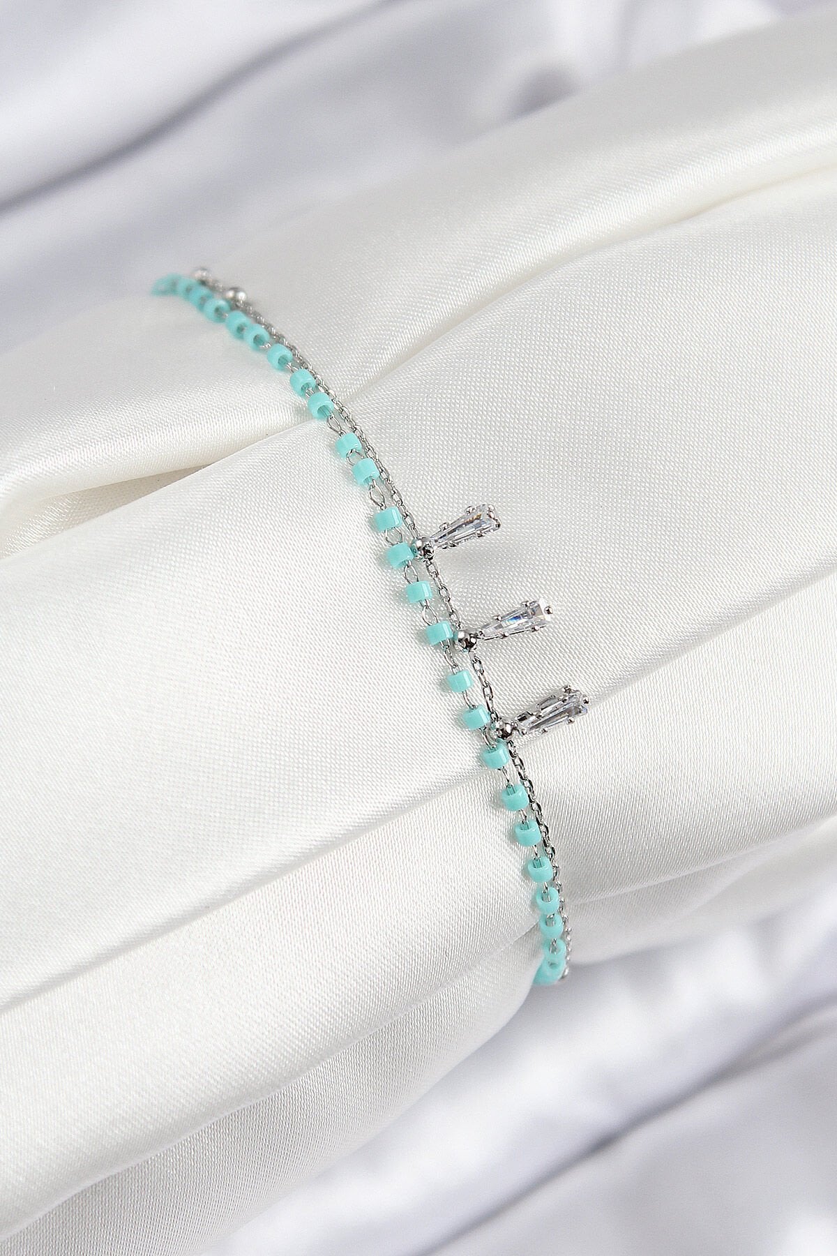 Pirinç Zirkon Taşlı Mavi Boncuklu Model Gümüş Renk Kadın Bileklik