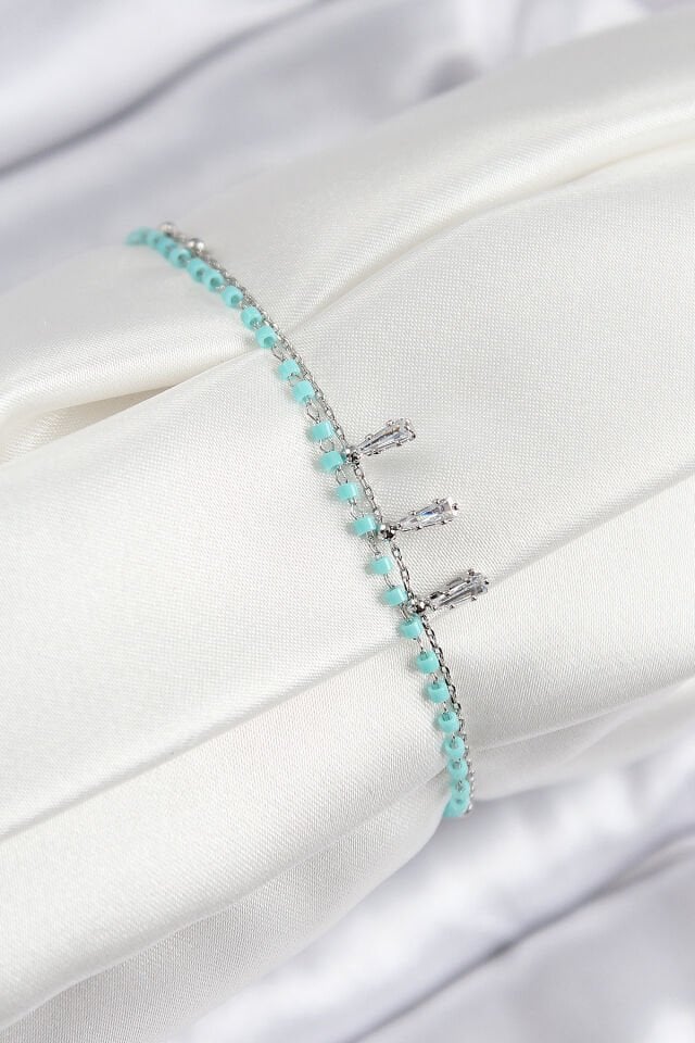 Pirinç Zirkon Taşlı Mavi Boncuklu Model Gümüş Renk Kadın Bileklik