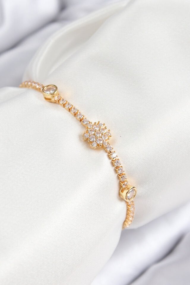 Pirinç Zirkon Taşlı Kar Tanesi Model Gold Renk Asansörlü Kadın Bileklik