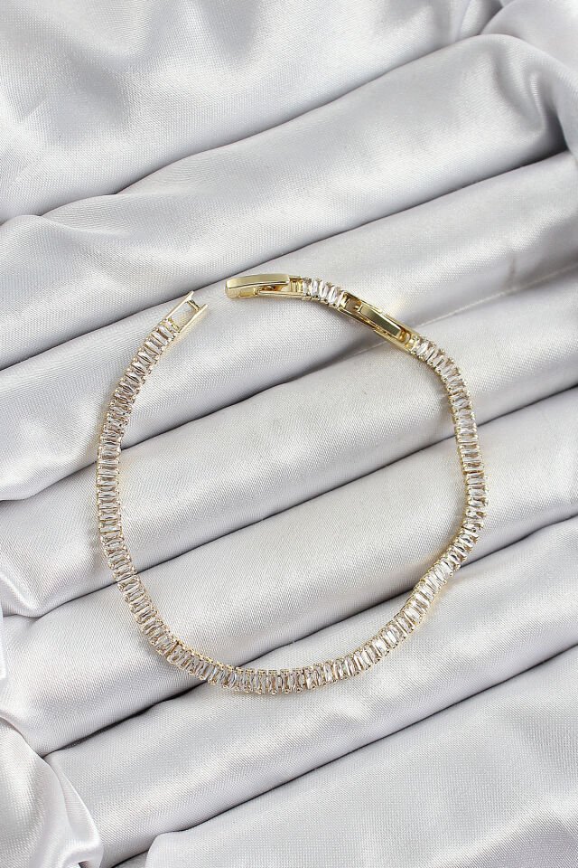 Pirinç Zirkon Taşlı İnce Su Yolu Model Gold Renk Kadın Bileklik